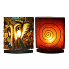 Starborn Sumatra Amber Ganesha face table lamp with LED bulb, featuring intricate Ganesha design and warm amber finish.
