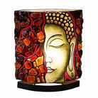 Sumatra Amber Buddha meditation face table lamp by Starborn Creations with LED bulb, showcasing a serene Buddha face design.