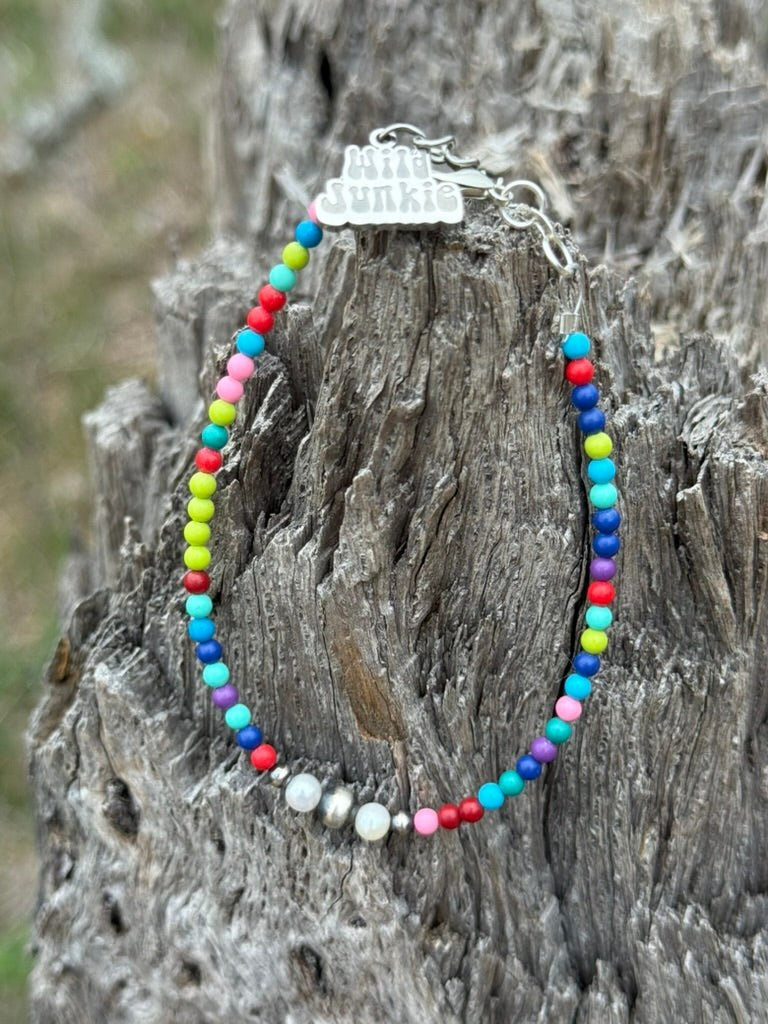 Sterling silver prism and pearl bracelet featuring a sleek design and elegant pearls, crafted by Wild Junkie.