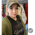Women wearing a Strong Women V Neck Tee from The Graphic Tee, featuring a casual SS Graphic Tee style with a fitted V-neck design.