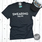 Unisex short sleeve crewneck graphic tee featuring "Swearing Helps" slogan by The Graphic Tee, casual and comfortable t-shirt.