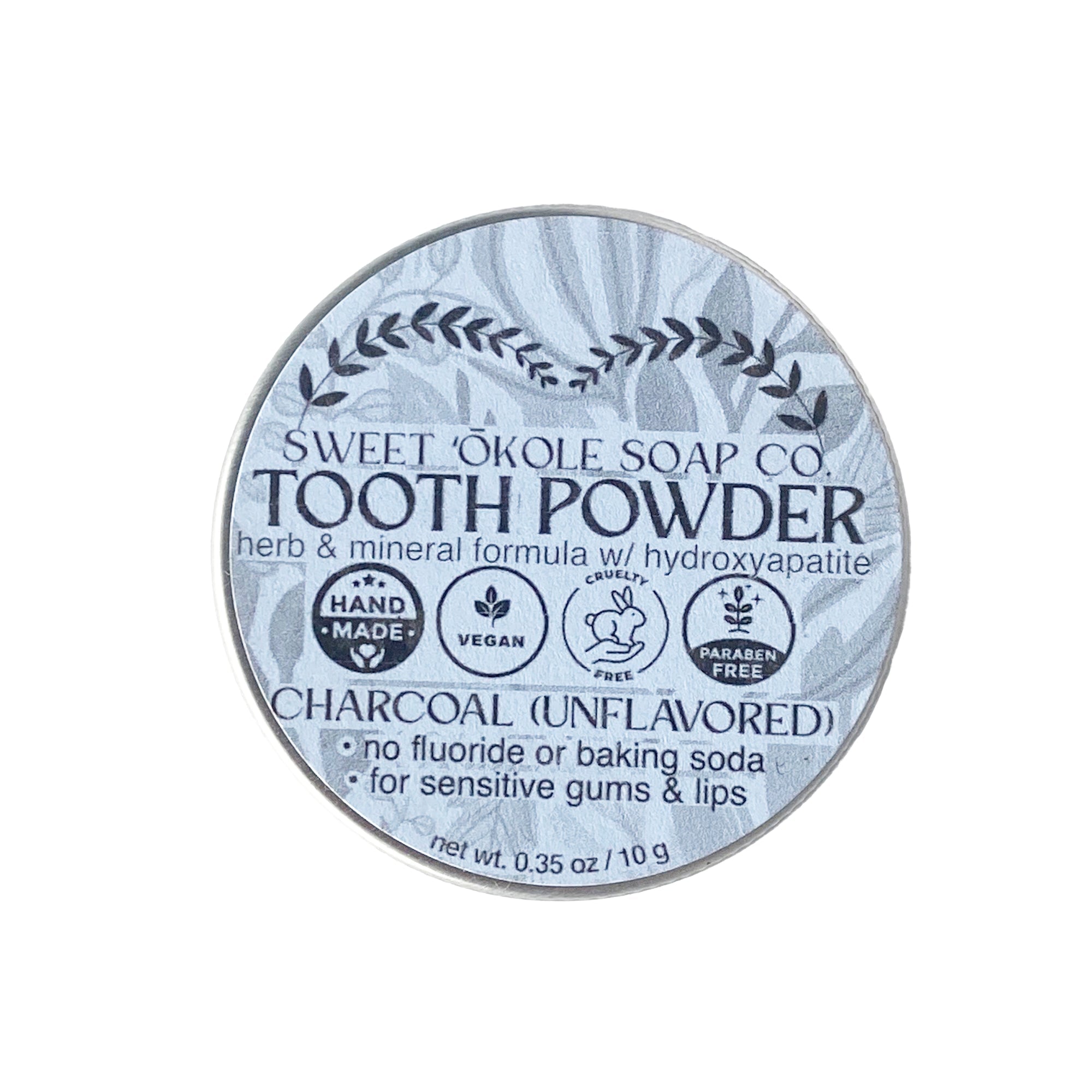 Unflavored charcoal tooth powder with 5% hydroxyapatite by Sweet ʻŌkole Soap, showing the powder in a natural container.