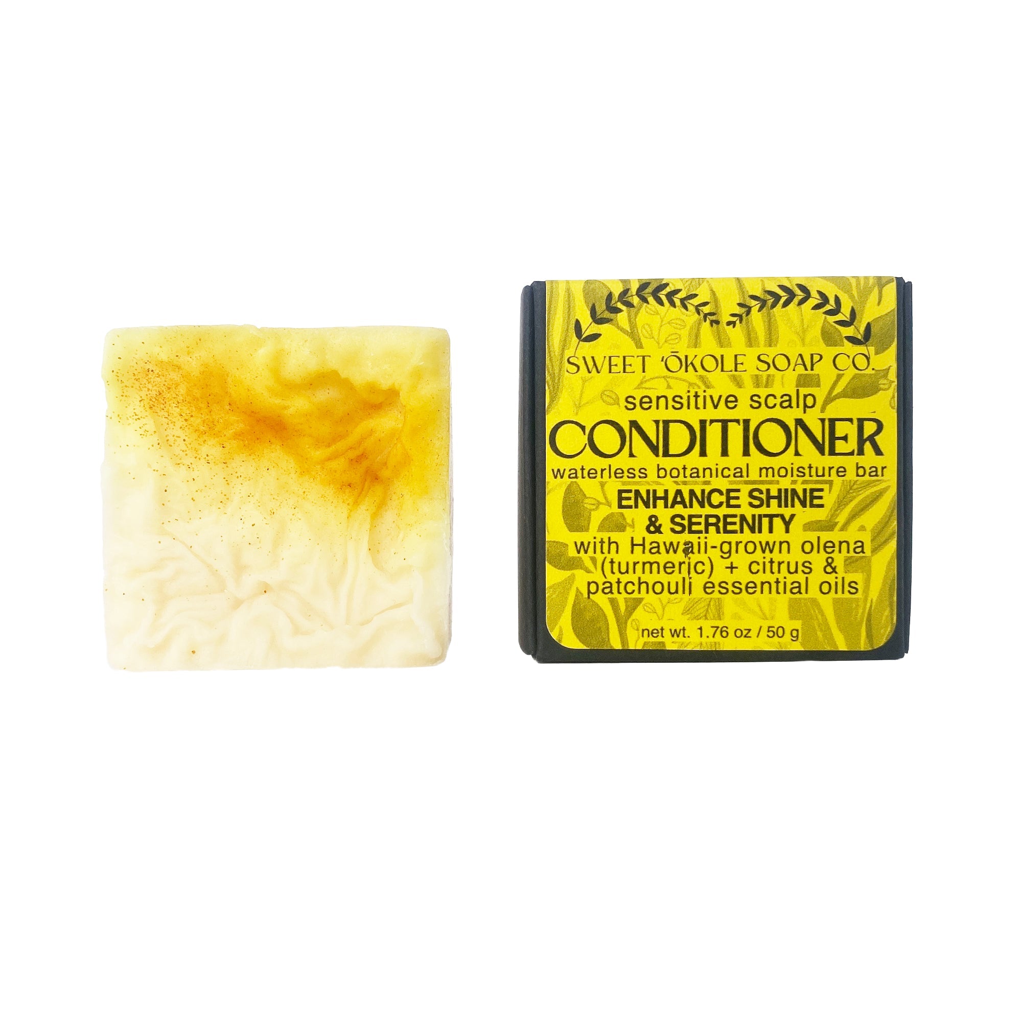 Essential oil conditioner bar with citrus and patchouli scents, infused with turmeric and Olena for nourishing hair care.