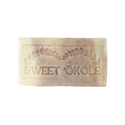 Lavender and clary sage soap by Sweet ʻŌkole Soap with noni and essential oils, showing a bar of soap with natural ingredients.
