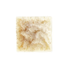 Natural conditioner bar by Sweet ʻŌkole Soap with eucalyptus, lime essential oils, and noni, shown in a close-up image.