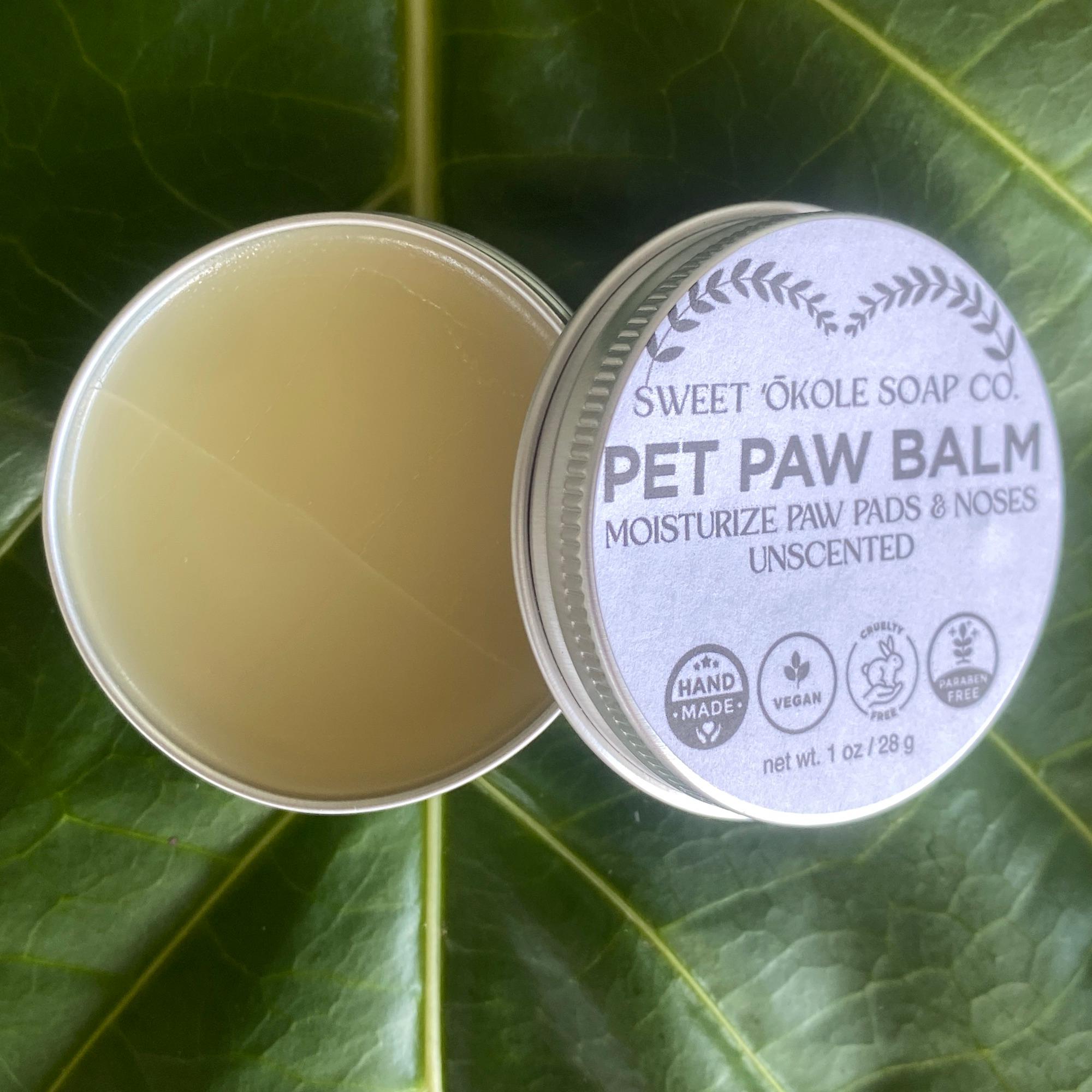 Natural Pet Paw Balm by Sweet ʻŌkole Soap, moisturizing paw salve for dogs and cats, shown in a jar with a smooth, creamy texture.
