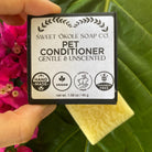 Unscented pet conditioner bar for dogs and cats by Sweet ʻŌkole Soap, natural fragrance-free grooming product with a solid bar format.