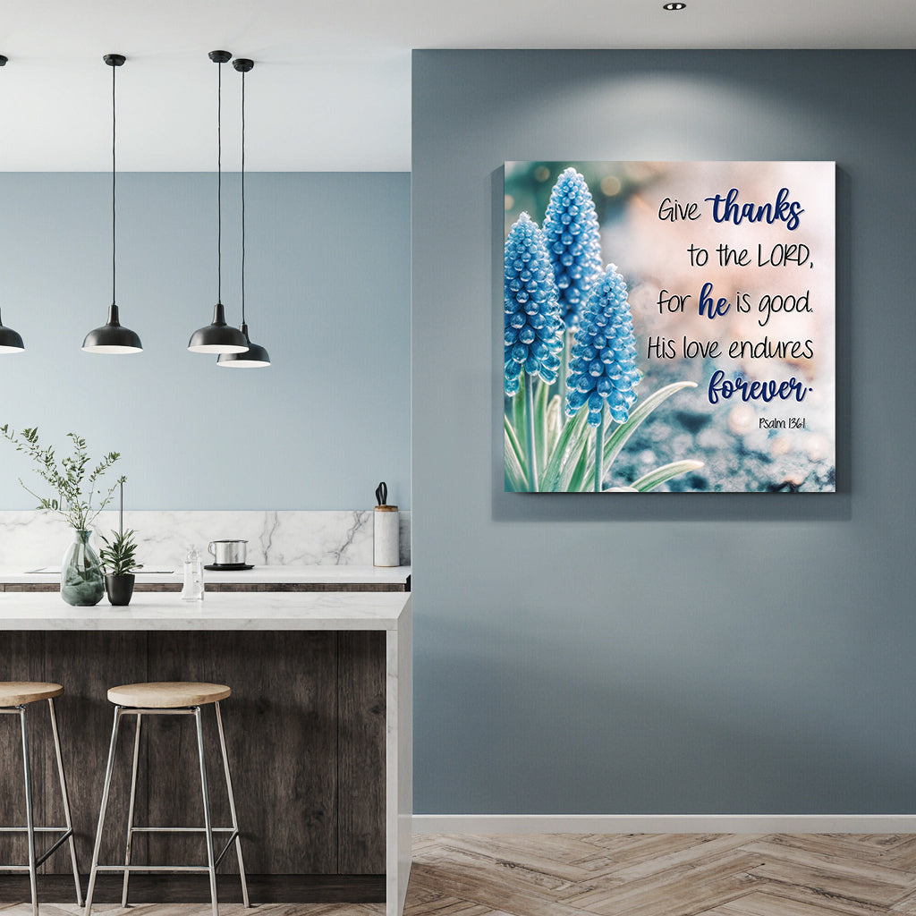 Canvas wall sign featuring Psalm 136:1 "Give Thanks To The Lord" with elegant lettering by Tailored Canvases.