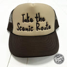 Foam trucker cap featuring scenic route graphic, casual outdoor style, with mesh back and curved brim.