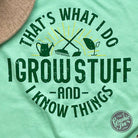 The Graphic Tee short sleeve graphic T-shirt with "That's What I Do I Grow Stuff" text, featuring a green plant illustration.