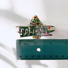 Velvet Claws glitter star hair claw accessory with purple and silver accents, suitable for stylish hair styling and decorative use.