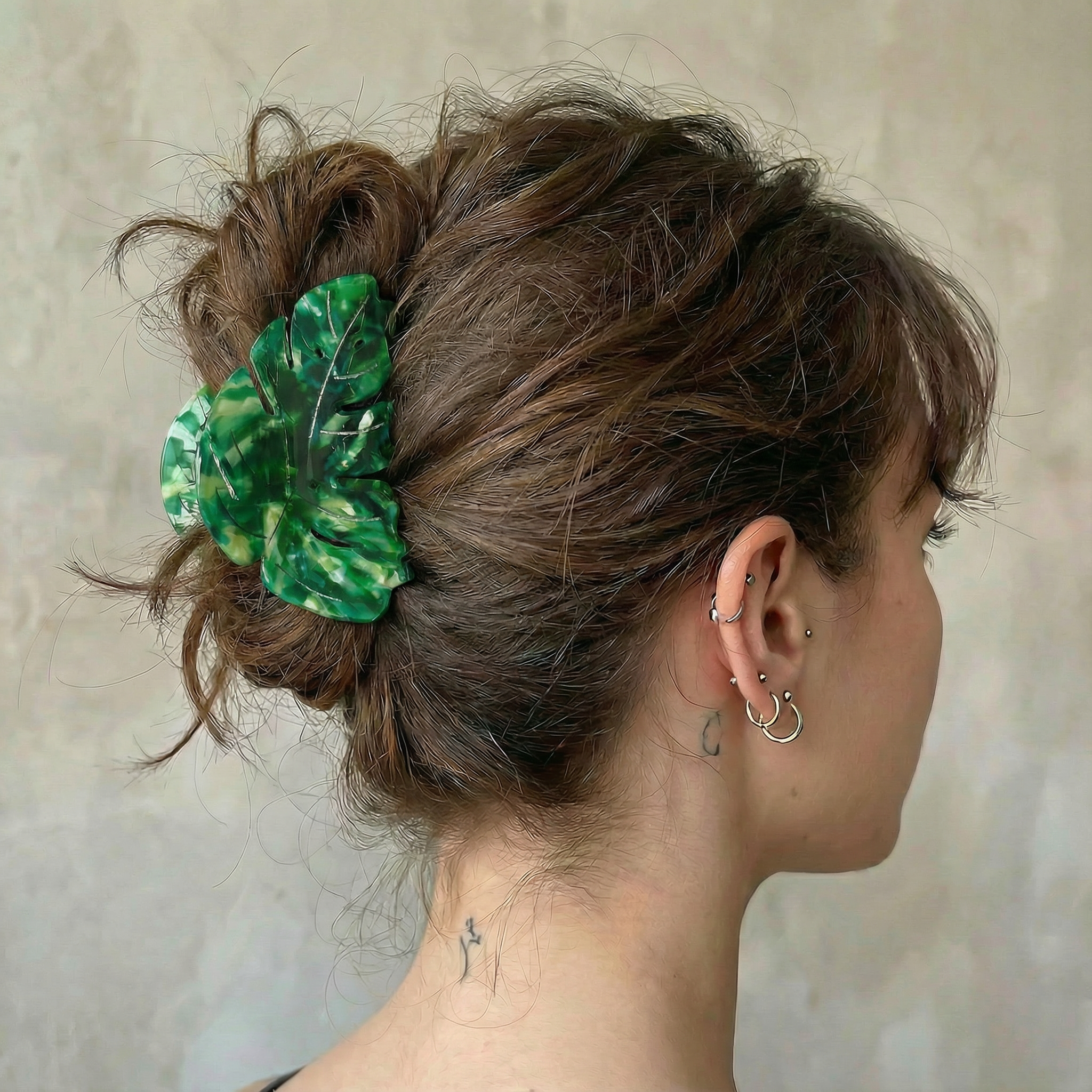 Velvet Claws Monstera leaf hair claw accessory with green velvet leaf design, perfect for stylish hair styling.