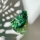 Velvet Claws Monstera Leaf hair claw accessory from The Bullish Store, featuring a green monstera leaf design for stylish hair styling