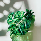 Velvet Claws Monstera leaf hair claw accessory with velvet texture and tropical leaf design, ideal for stylish hair styling.