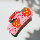 Velvet Claws strawberry granny square hair claw from The Bullish Store, floral accessory for stylish hair styling.