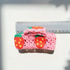 Velvet Claws strawberry granny square hair claw by The Bullish Store, featuring a soft velvet texture and colorful granny square design.