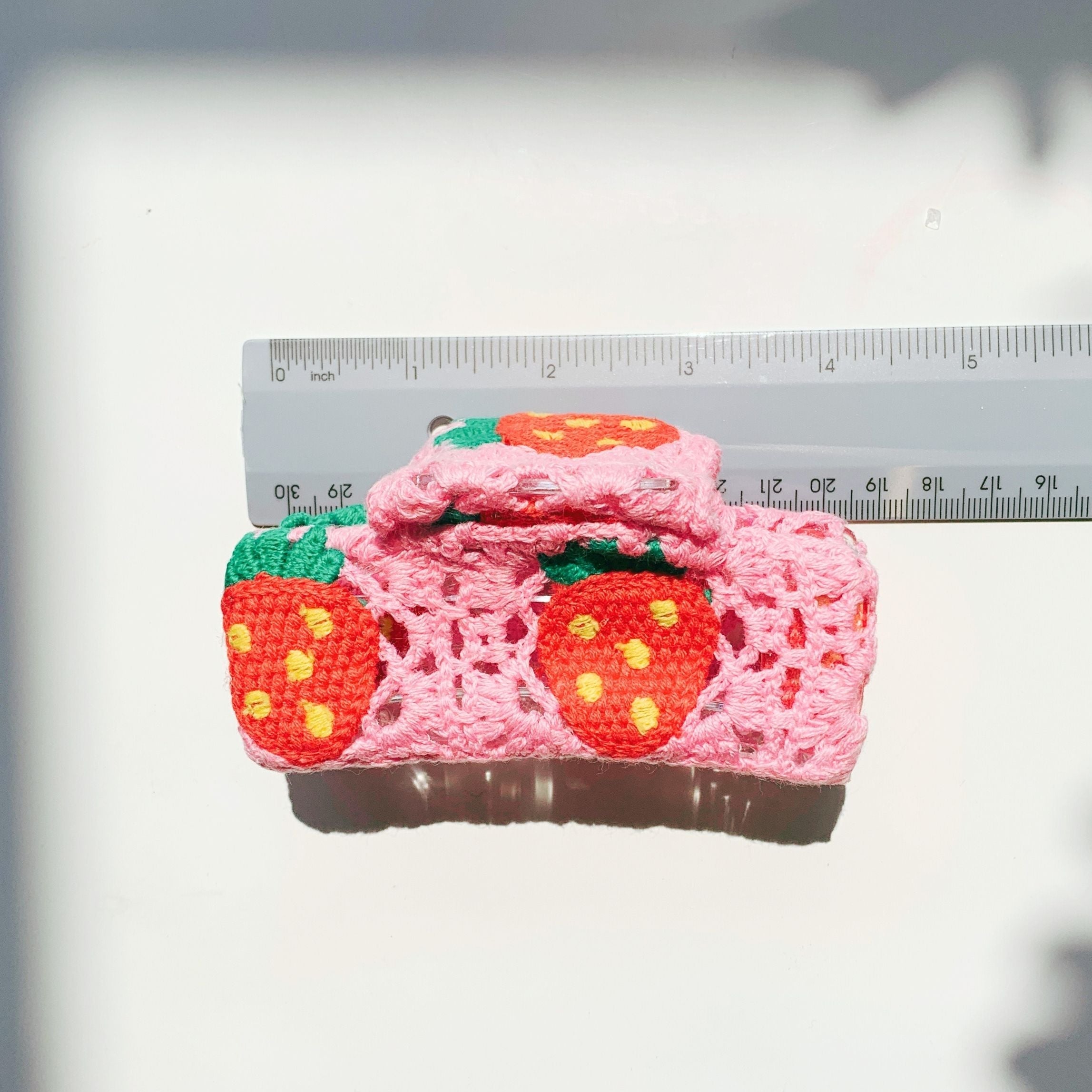 Velvet Claws strawberry granny square hair claw by The Bullish Store, featuring a soft velvet texture and colorful granny square design.
