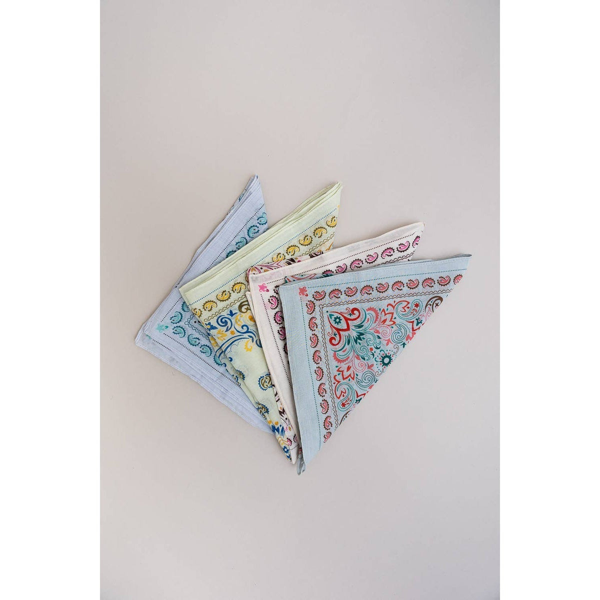 Teal vintage paisley bandana by The Bullish Store featuring colorful patterns, versatile scarf or necktie, and handkerchief style.