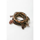 Stack of 10 boho stone and bead stretch bracelets from The Bullish Store, showcasing colorful, stackable jewelry with natural stone accents.