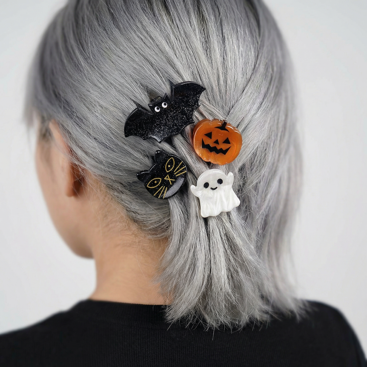 Set of 4 velvet spooky hair claws from The Bullish Store, mini claw clips with claw design in giftable pouch.