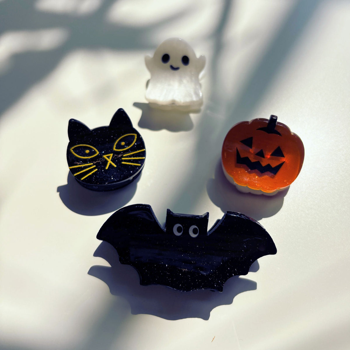 Set of 4 velvet claw hair clips from The Bullish Store, mini spooky style in a giftable pouch, perfect for stylish hair accessories.