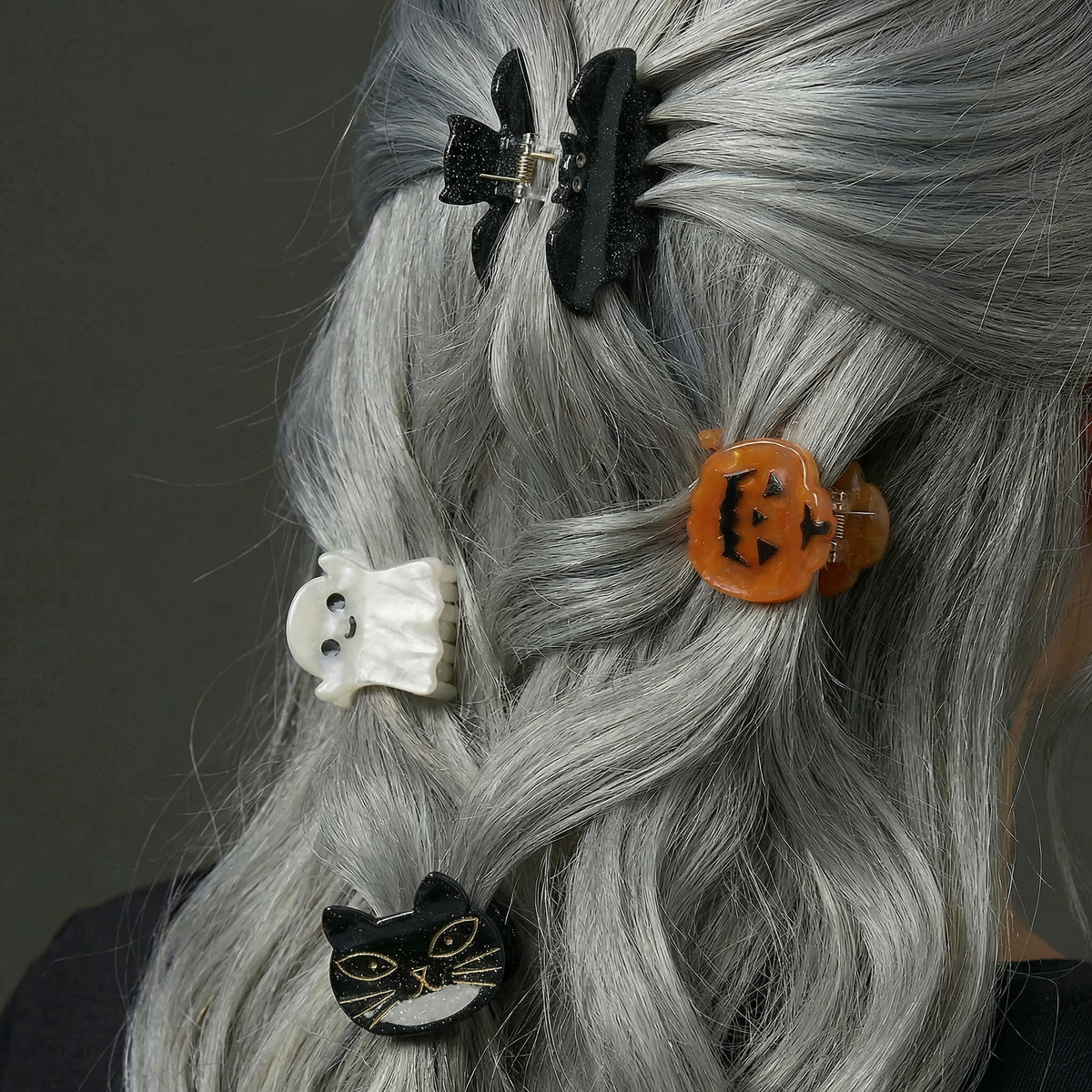 Set of 4 velvet mini spooky hair claw clips by The Bullish Store, shown in a giftable pouch, perfect for stylish hair accessories.
