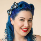 Set of two Sourpuss blue leopard glitter hair bows, rockabilly hair accessories, leopard print hair clips for vintage style.