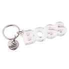 Clear acrylic Boss word keychain from The Bullish Store, transparent and word-shaped keyholder with a smooth finish.