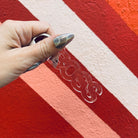 Clear acrylic Boss word keychain from The Bullish Store, transparent word-shaped keyholder with a metal keyring attachment.