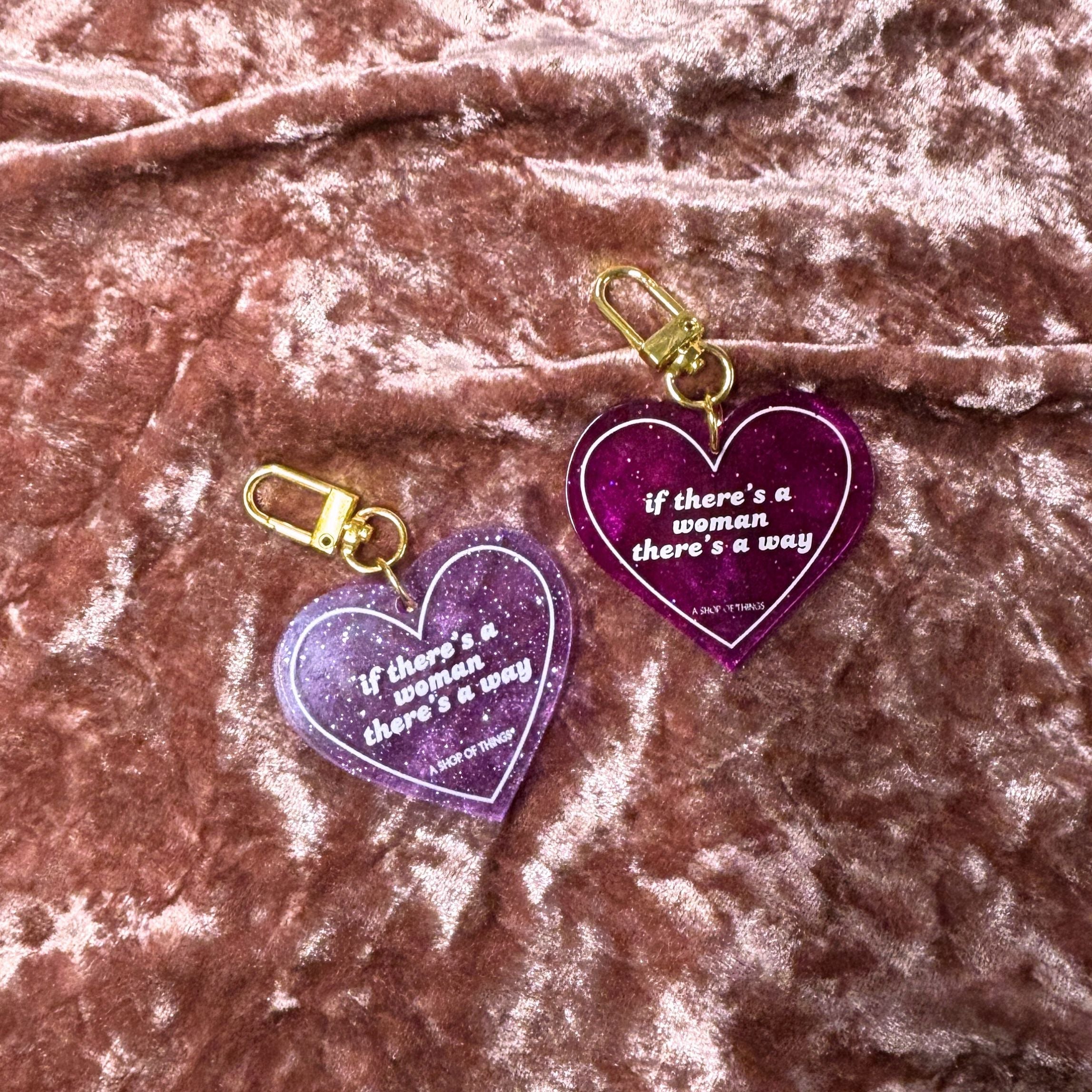 Heart-shaped keychain with "If There's A Woman There's A Way" inscription from The Bullish Store, featuring a detailed design.