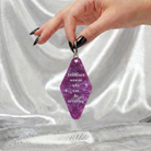 Purple marble keychain with a woman figure and inspirational quote, perfect for women, by The Bullish Store.
