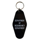 Black Motel Style keychain from the Department of Redundancy Department, featuring bold branding and durable metal construction.