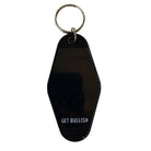 Black Department of Redundancy Department Motel Style keychain with metal loop and engraved logo for fans of quirky accessories.