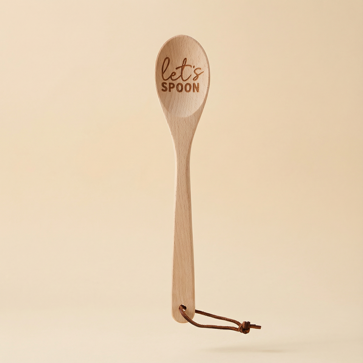 Let's Spoon wooden cooking spoon from The Bullish Store, beech wood utensil in a canvas gift bag, perfect for kitchen use and gifting.