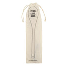 Wooden cooking spoon with "Peace Love Bake" engraving, packed in a muslin gift bag, from The Bullish Store kitchen utensils collection.