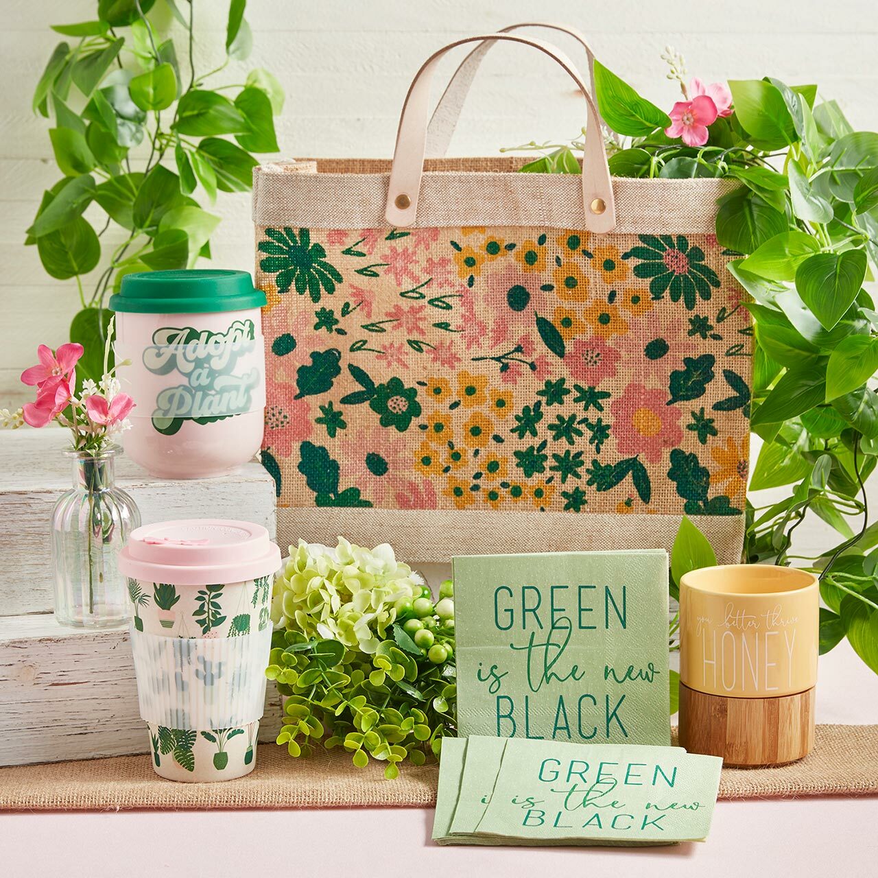Ceramic adopt-a-plant to-go mug with 16 oz capacity, silicone lid, and sleeve, featuring a plant-themed design from The Bullish Store.