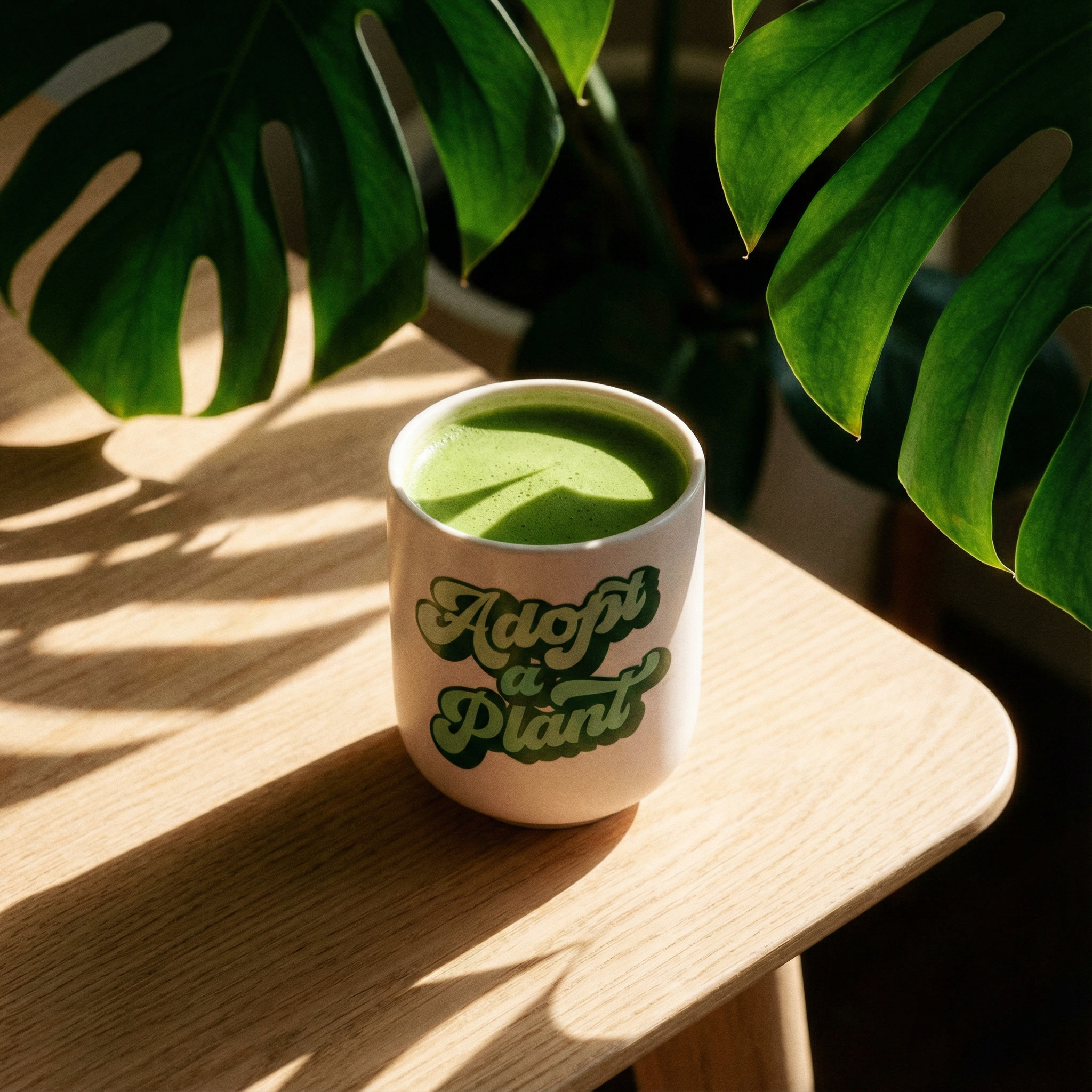 Adopt a Plant ceramic to-go mug with 16 oz. capacity, silicone lid, and sleeve, featuring eco-friendly design from The Bullish Store.