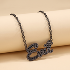 Sourpuss “Evil” pendant necklace with black rhinestones, Gothic statement jewelry featuring an edgy, dark design.
