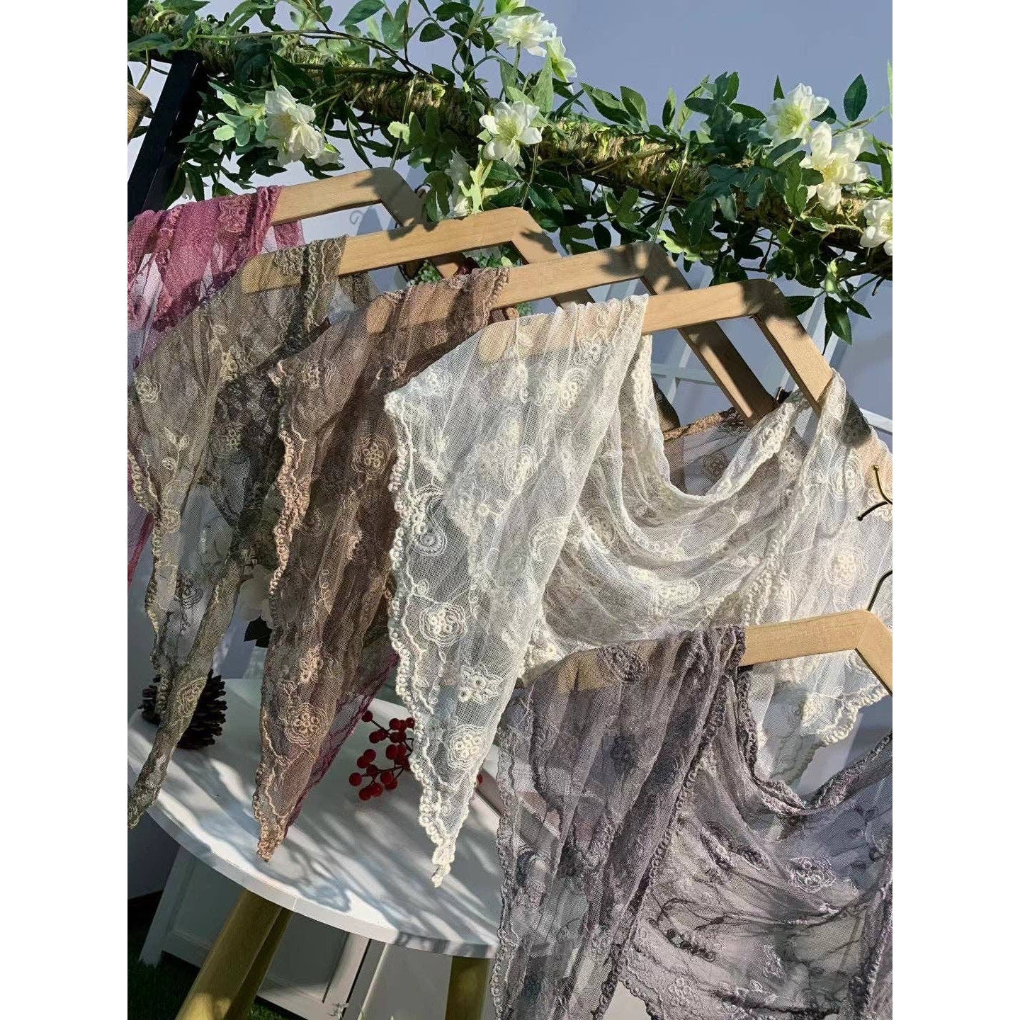 Elegant lace shawl or shrug with embroidered stemmed flowers, perfect as a romantic novel heroine accessory by The Bullish Store.