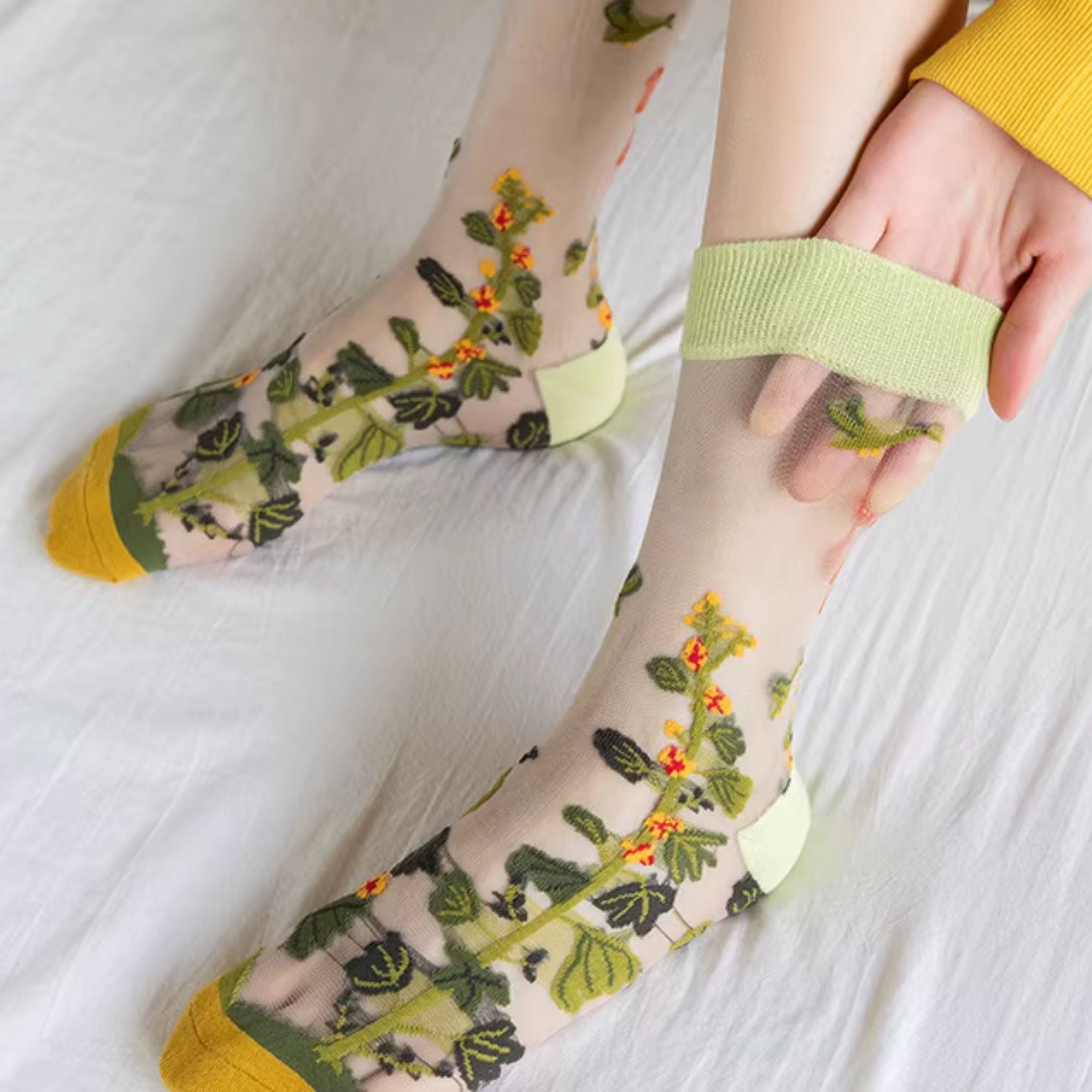 Sheer plant lover women's socks in five nature-inspired styles, fits sizes 5-9, from The Bullish Store.