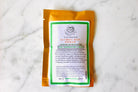 The Earthly Alternative Aloe, Marshmallow, & Nettle Ultimate Deep Conditioner in a 2 oz jar with green and white packaging.