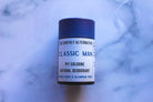 The Earthly Alternative Pit Cologne Deodorant for men, featuring a natural stick formula in a sleek container.