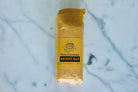 Bright Bar from The Earthly Alternative, a natural skincare product with a vibrant, colorful bar featuring botanical ingredients.