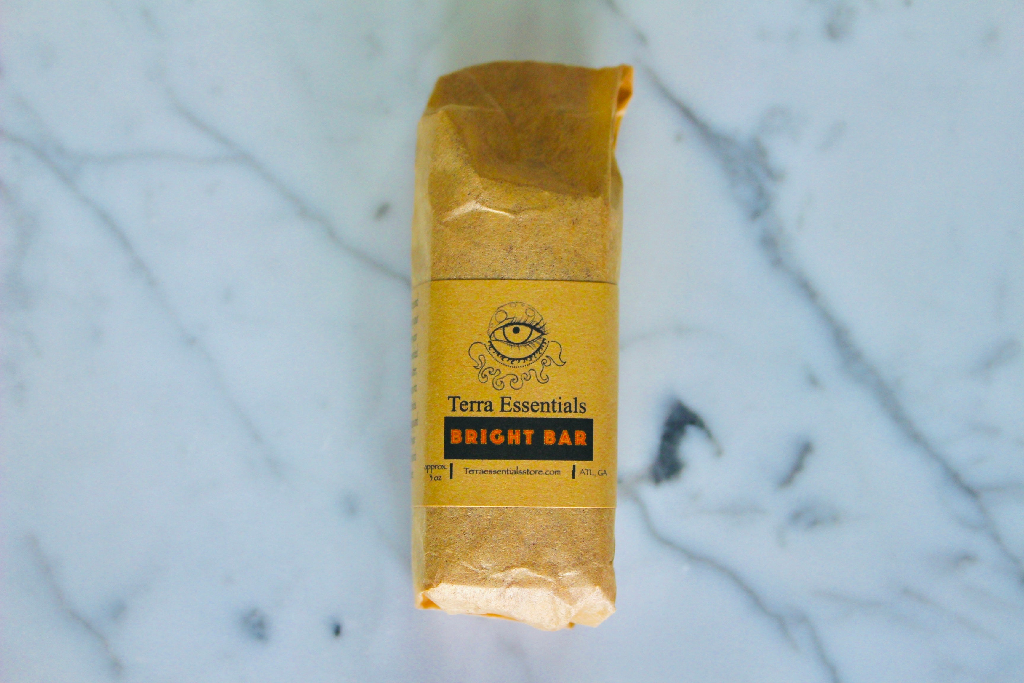 Bright Bar from The Earthly Alternative, a natural skincare product with a vibrant, colorful bar featuring botanical ingredients.