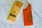 Bright Bar by The Earthly Alternative, a natural health supplement with a sleek design, shown in a close-up image.