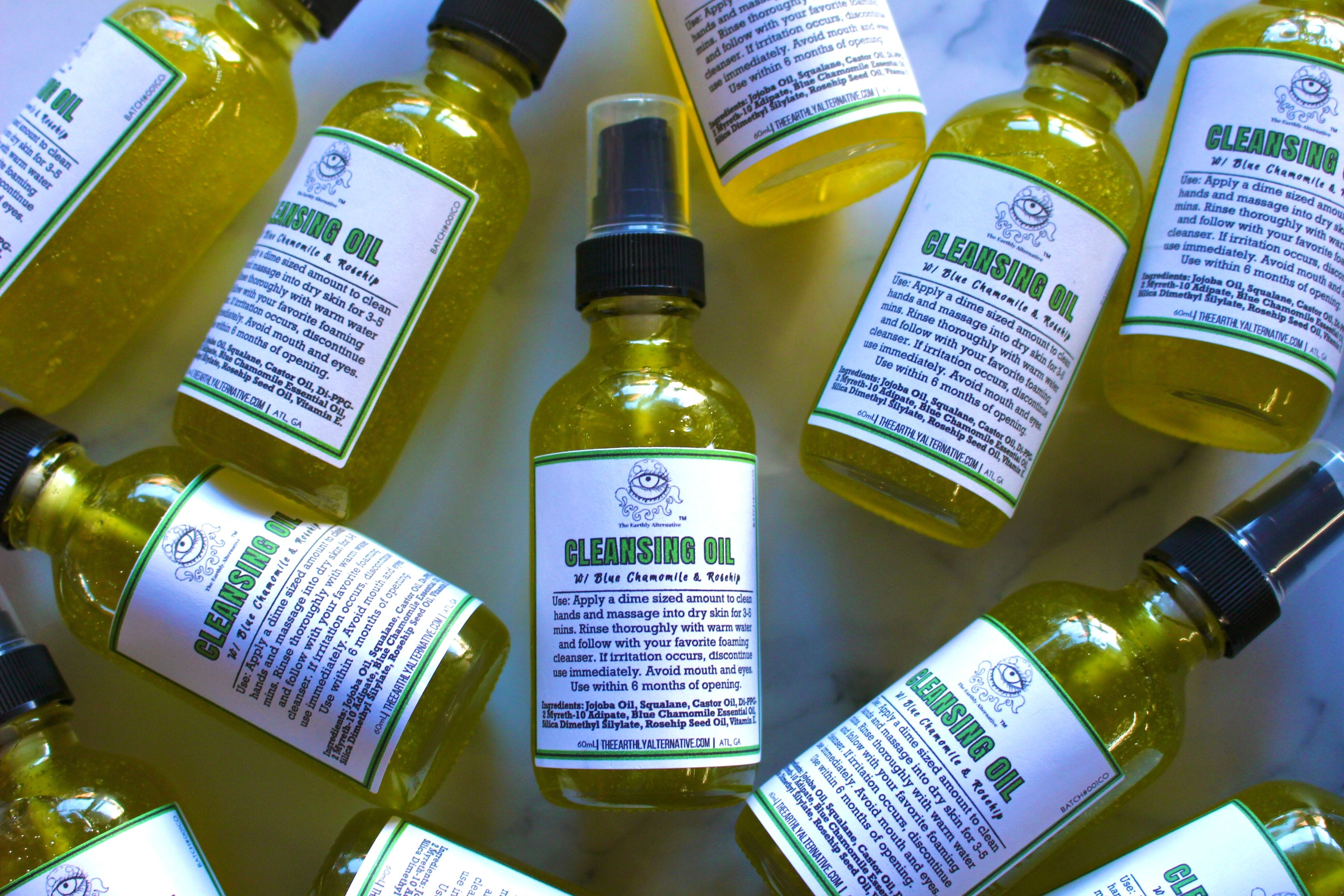 The Earthly Alternative cleansing oil bottle with pump dispenser, designed for gentle facial cleansing and skincare.