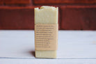 The Earthly Alternative facial bar soap with natural ingredients, showing a rustic, eco-friendly packaging and a textured soap bar.