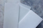 Reusable wax strips from The Earthly Alternative, showing a set of natural waxing strips ready for hair removal.