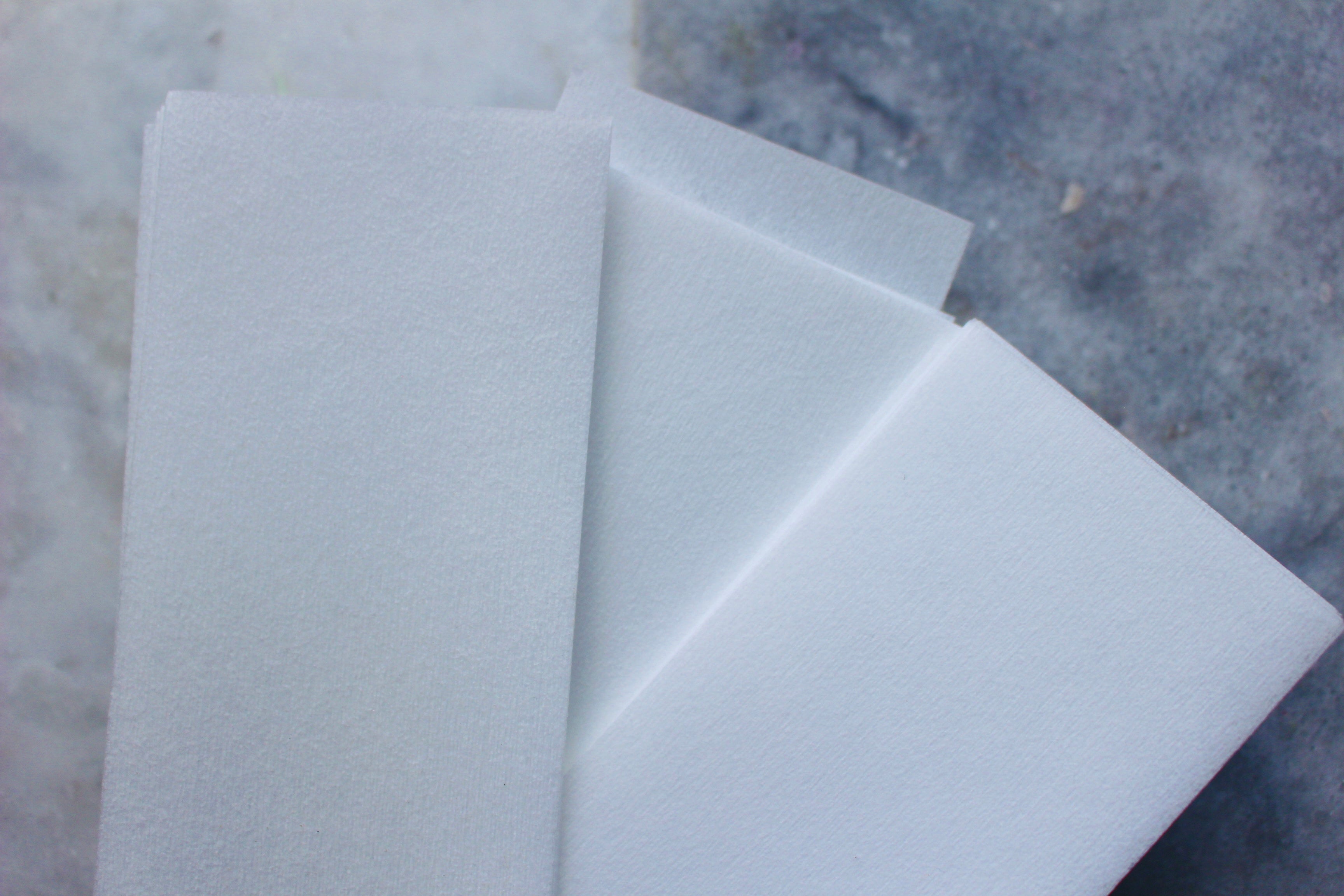 Reusable wax strips from The Earthly Alternative, showing a set of natural waxing strips ready for hair removal.