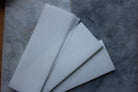 Reusable wax strips from The Earthly Alternative, natural hair removal strips with a reusable design for eco-friendly waxing.